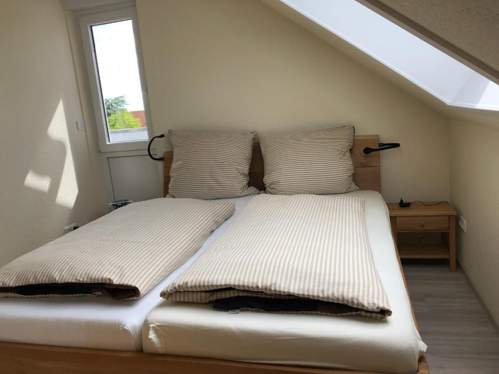 Postel nebo postele na pokoji v ubytování Haus Rechteck