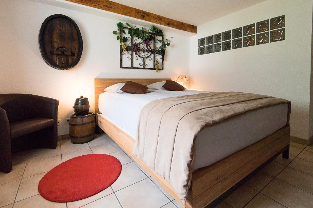 Postel nebo postele na pokoji v ubytování Rêves Gourmands, Hôtellerie & Gastronomie