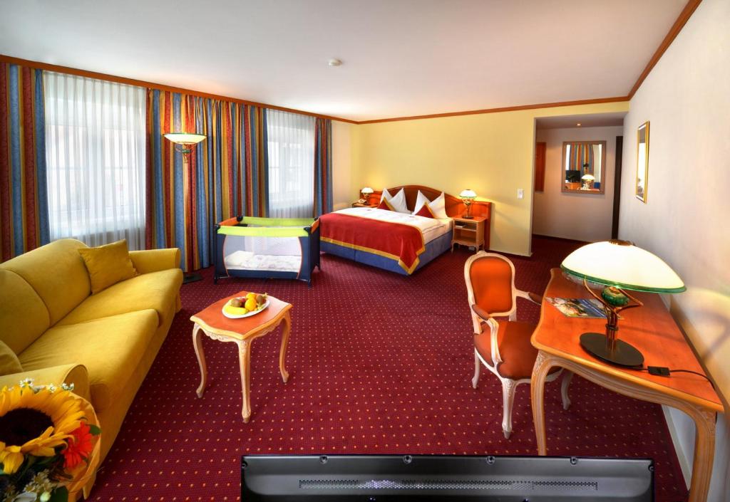 Postel nebo postele na pokoji v ubytování Luitpoldpark-Hotel