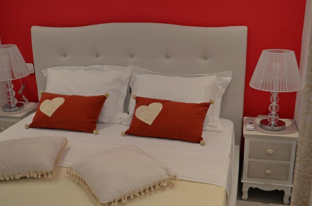 Postel nebo postele na pokoji v ubytování Aloe house Lakithra