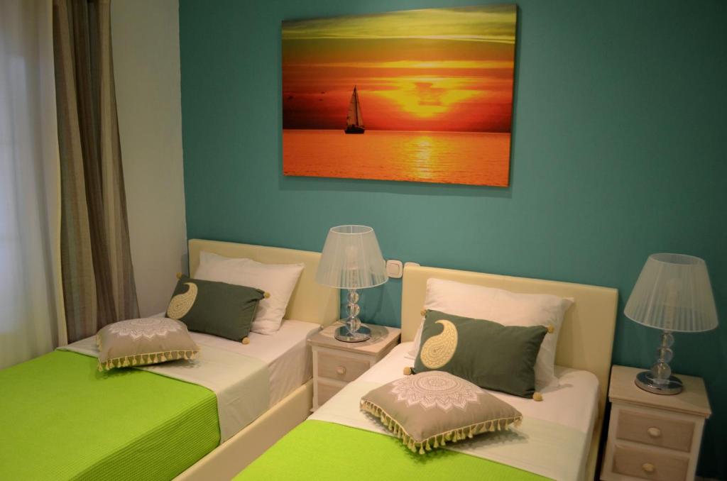Postel nebo postele na pokoji v ubytování Aloe house Lakithra