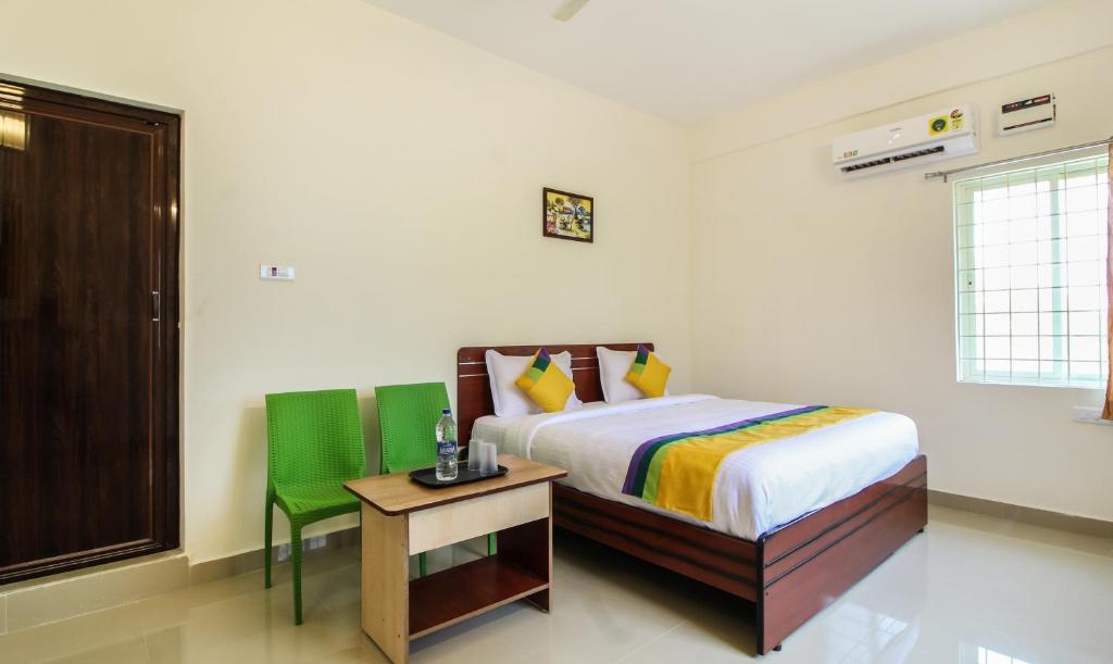 Postel nebo postele na pokoji v ubytování Itsy Hotels Riyas Grand