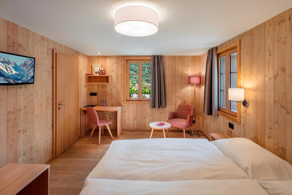Postel nebo postele na pokoji v ubytování Hotel Nest- und Bietschhorn