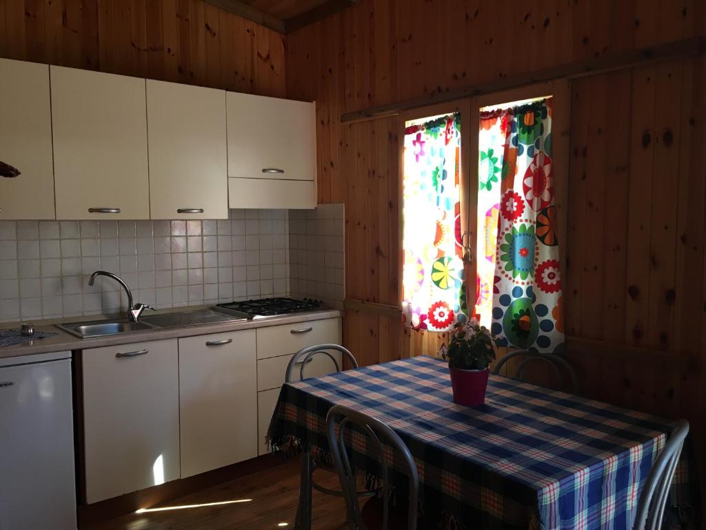 Kuchyň nebo kuchyňský kout v ubytování camping feniglia