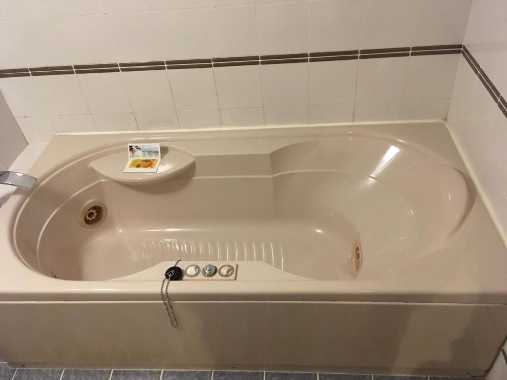 Koupelna v ubytování Hotel Noel
