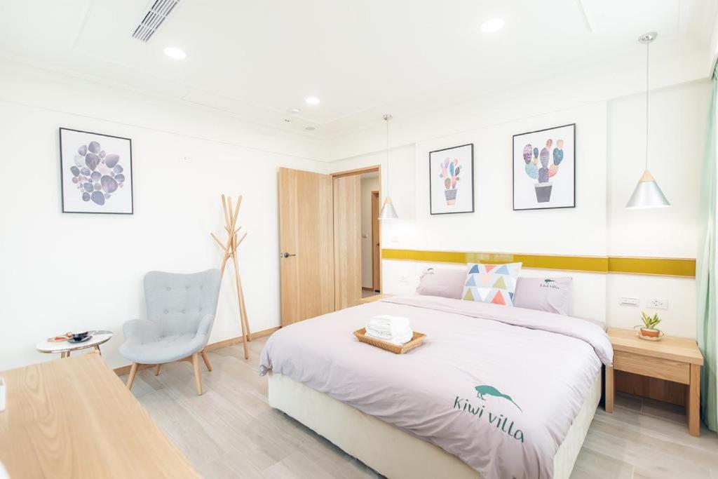 Postel nebo postele na pokoji v ubytování Kiwi Villa