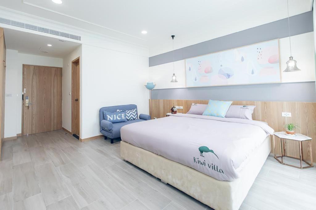 Postel nebo postele na pokoji v ubytování Kiwi Villa