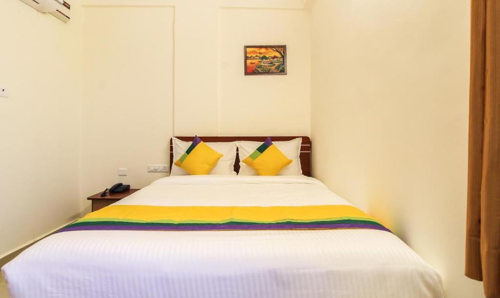 Postel nebo postele na pokoji v ubytování Itsy Hotels Riyas Grand