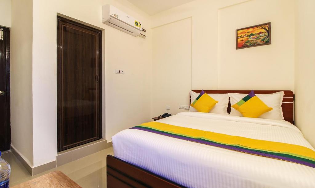 Postel nebo postele na pokoji v ubytování Itsy Hotels Riyas Grand