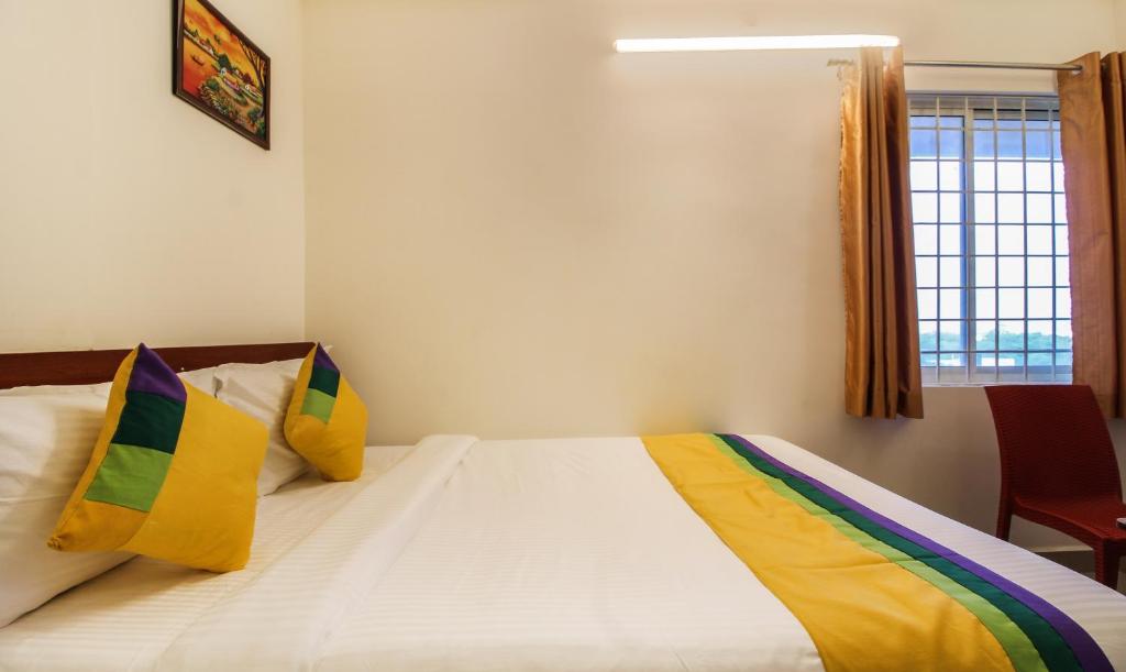 Postel nebo postele na pokoji v ubytování Itsy Hotels Riyas Grand