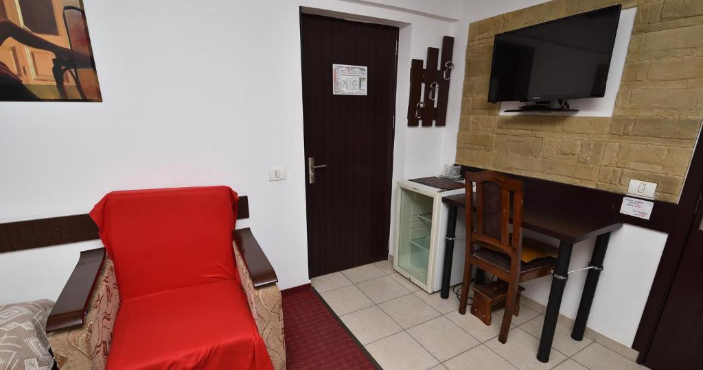 TV a/nebo společenská místnost v ubytování Hotel Taco