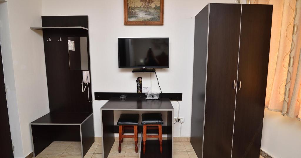 TV a/nebo společenská místnost v ubytování Hotel Taco