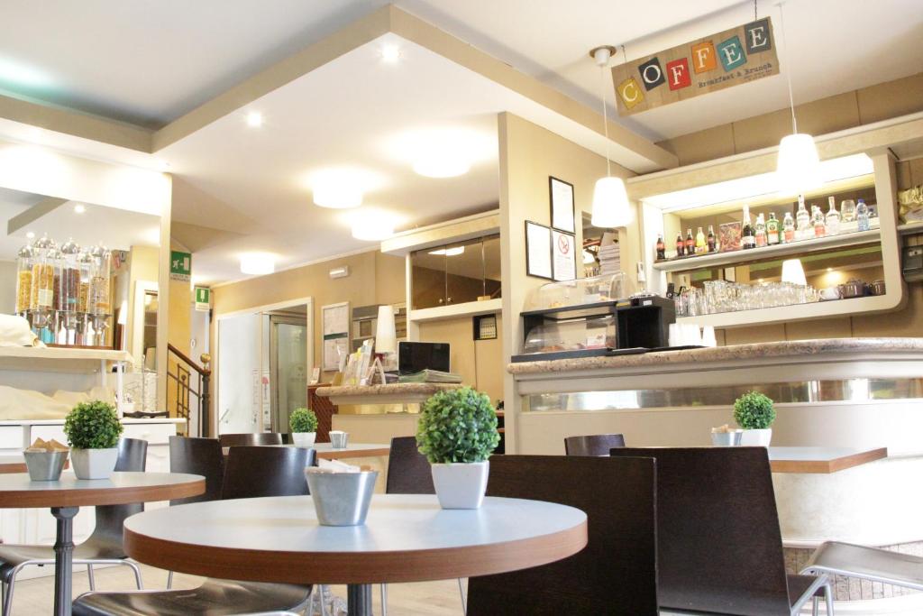 Kuchyň nebo kuchyňský kout v ubytování Hotel MM Dateo