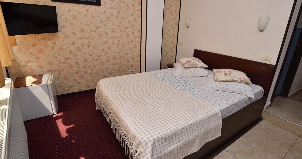 Postel nebo postele na pokoji v ubytování Hotel Taco