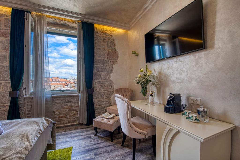 Posteľ alebo postele v izbe v ubytovaní Riva Palace - design rooms