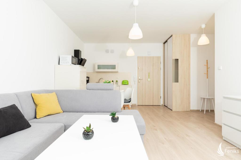 Kuchyňa alebo kuchynka v ubytovaní Feniks SPA Apartments 10 by Jantar Apartamenty Kołobrzeg