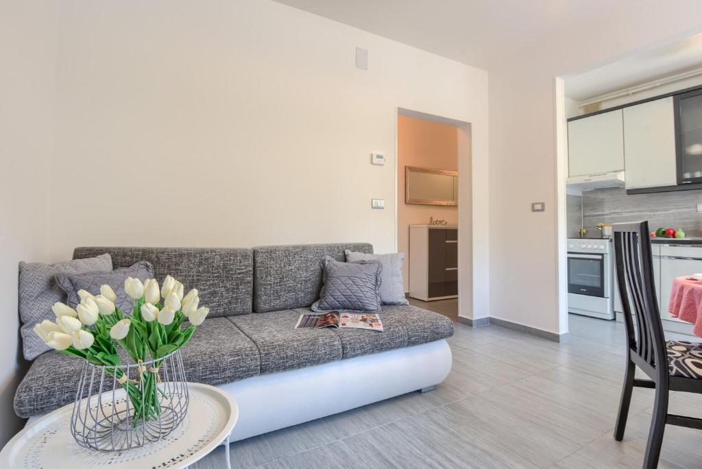 Kuchyň nebo kuchyňský kout v ubytování Esther Apartment