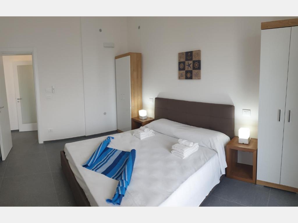 A bed or beds in a room at Medusa room apartment