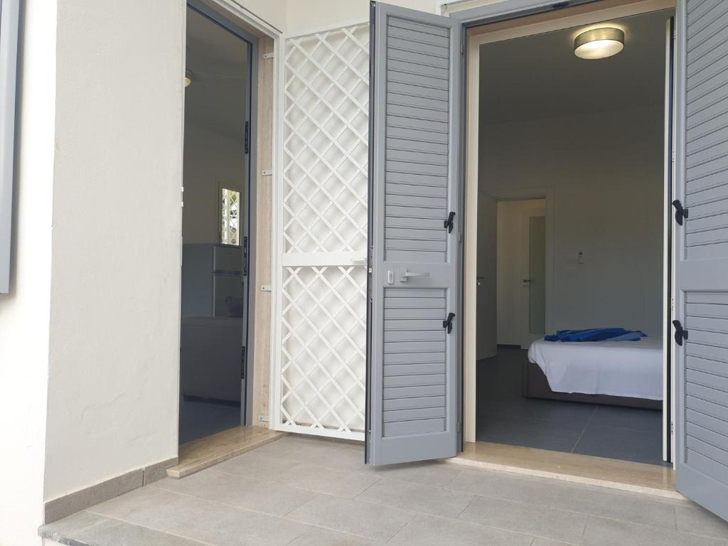 A bed or beds in a room at Medusa room apartment