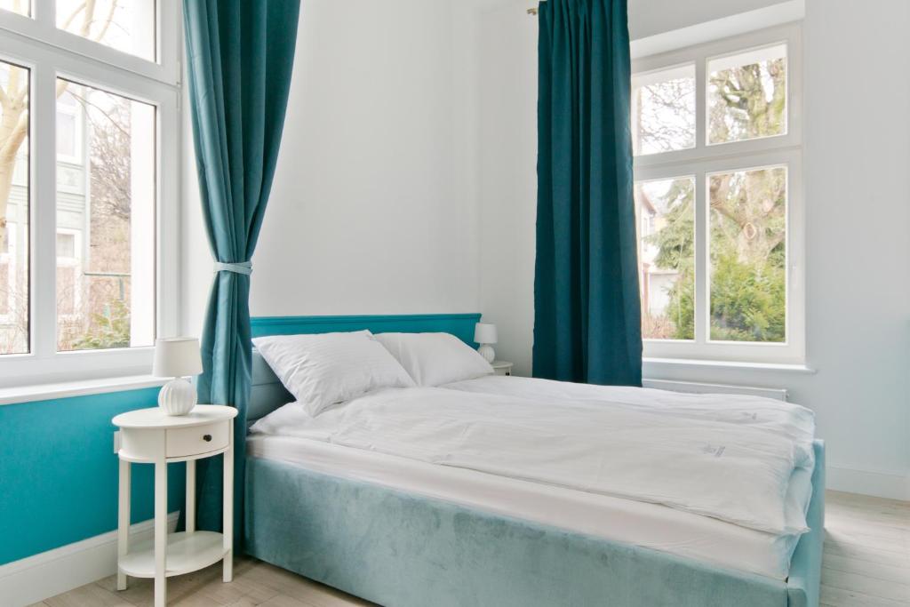 Posteľ alebo postele v izbe v ubytovaní Imperial Apartments Helska
