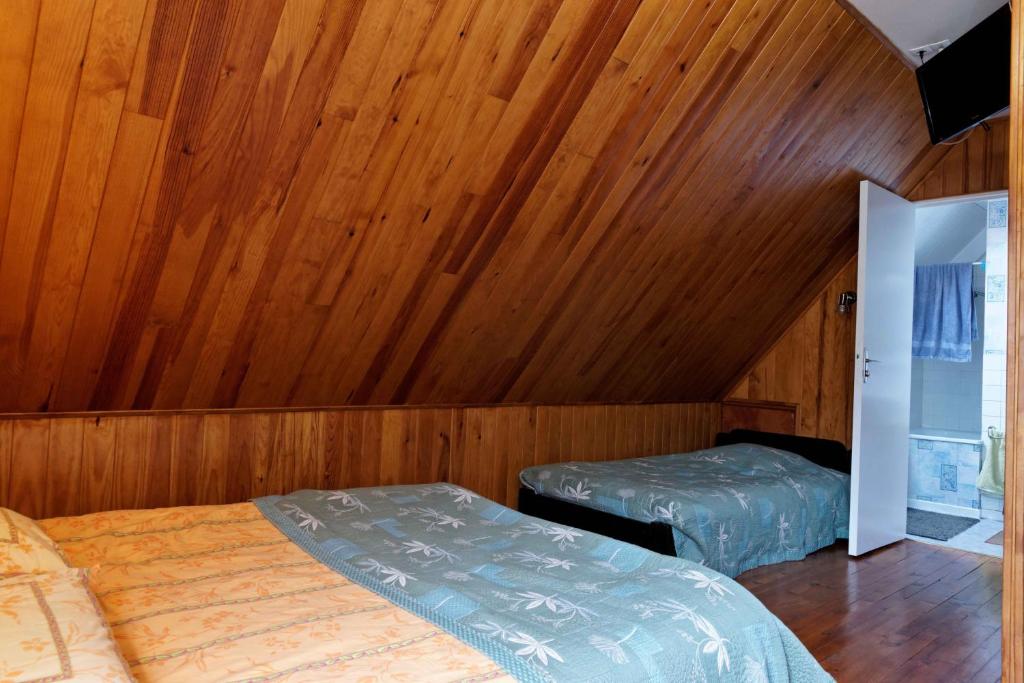 Postel nebo postele na pokoji v ubytování Chambres d'hotes à Autun
