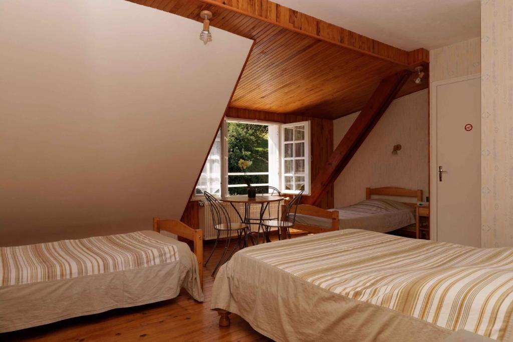 Postel nebo postele na pokoji v ubytování Chambres d'hotes à Autun