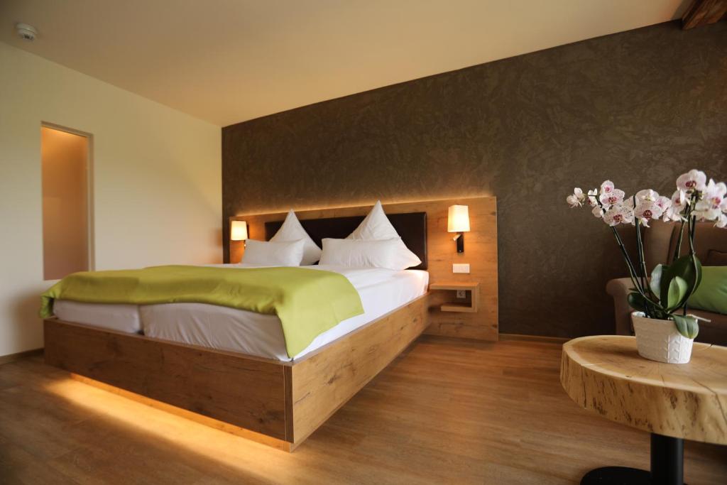 Postel nebo postele na pokoji v ubytování PETERS Hotel & Spa