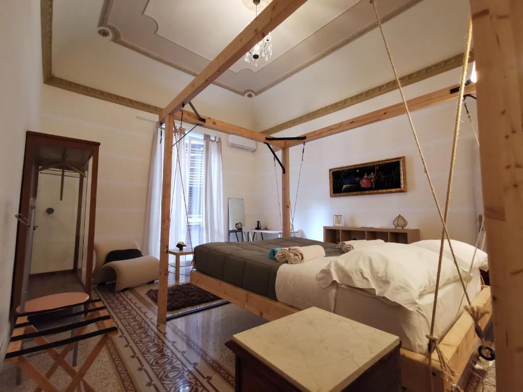 Postel nebo postele na pokoji v ubytování Artisan Maison Palermo