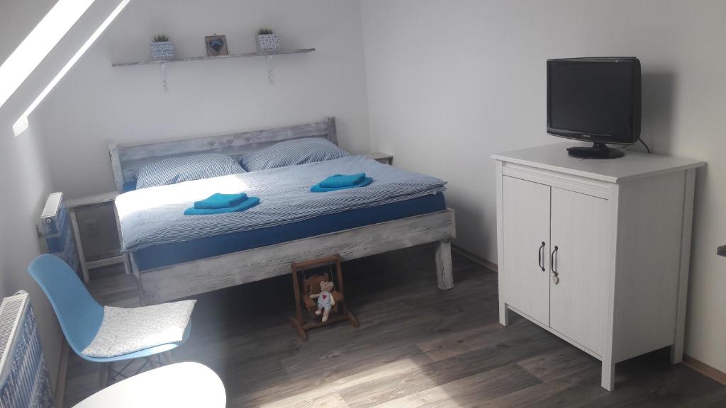 Postel nebo postele na pokoji v ubytování Ubytování Otín