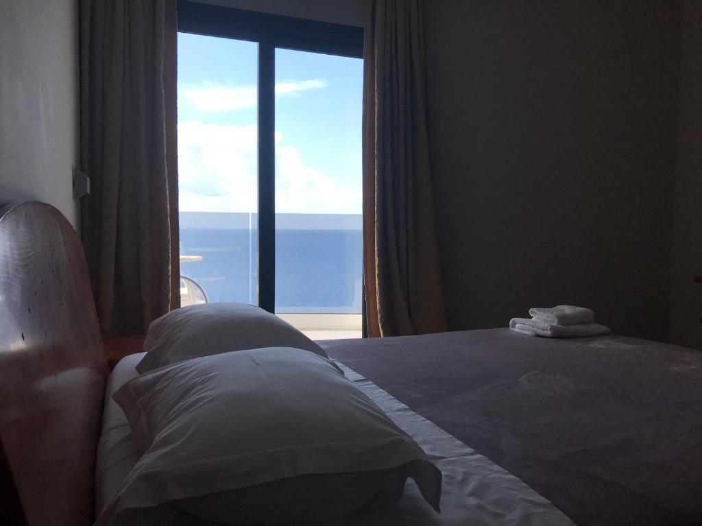 Postel nebo postele na pokoji v ubytování Hotel Saranda International