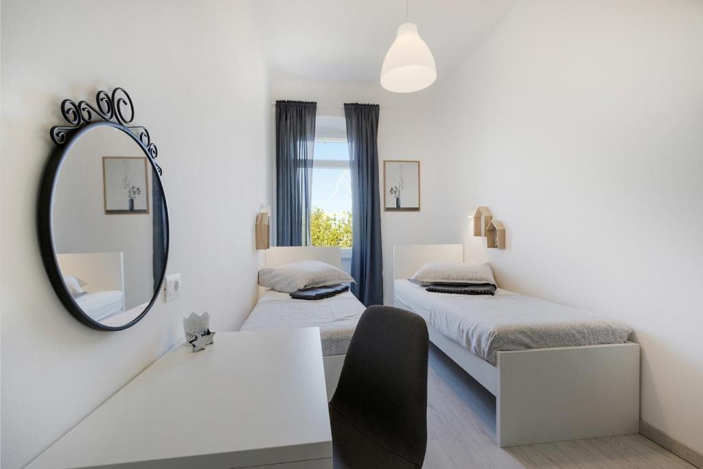 Posteľ alebo postele v izbe v ubytovaní *** Lounge terrace apartment with the harbour view / city centre ***