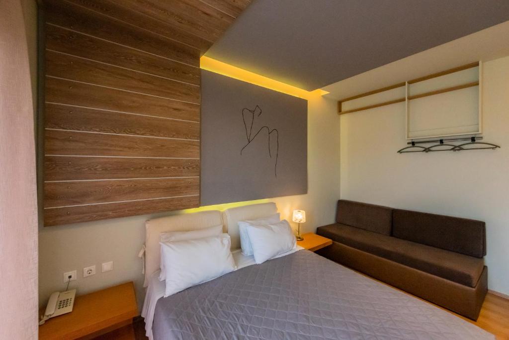 Postel nebo postele na pokoji v ubytování Kleopatra Inn