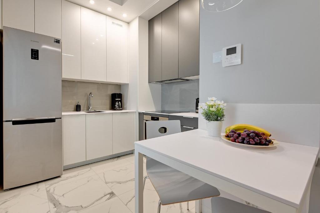 Kuchyňa alebo kuchynka v ubytovaní Luxury Voyage Apartments + extra bikes