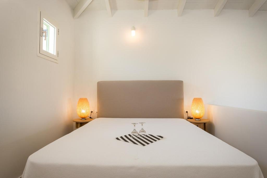Postel nebo postele na pokoji v ubytování Neapoli Villas