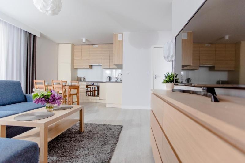 Kuchyňa alebo kuchynka v ubytovaní Resort Apartamenty Klifowa Rewal 23