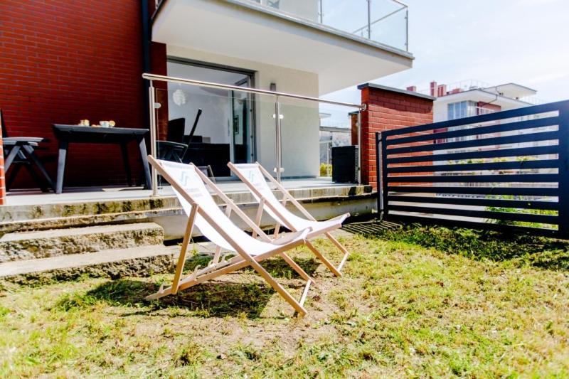 Vonkajšia záhrada v ubytovaní Resort Apartamenty Klifowa Rewal 23