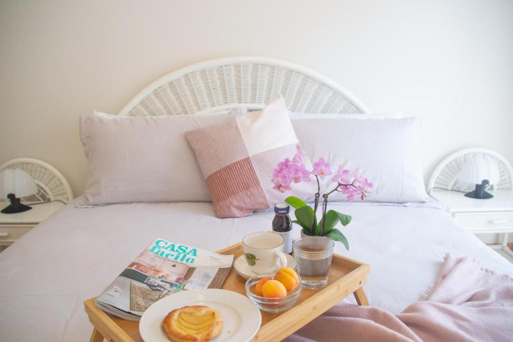 A bed or beds in a room at Casa Brunetta - WelcHome