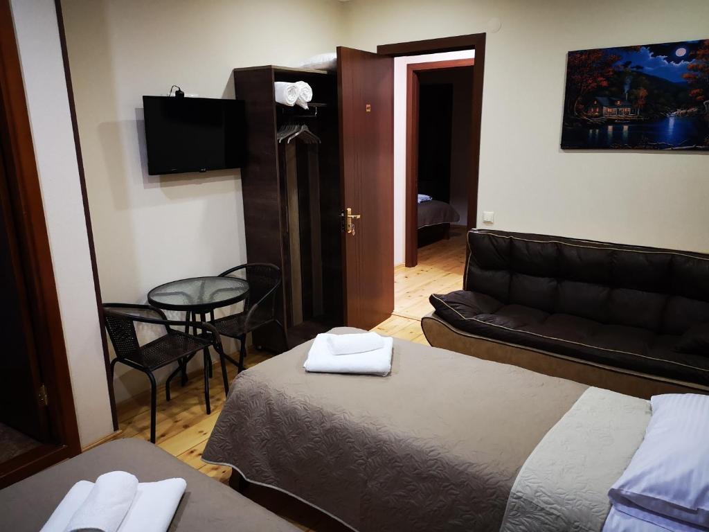 Postel nebo postele na pokoji v ubytování Hotel Villa