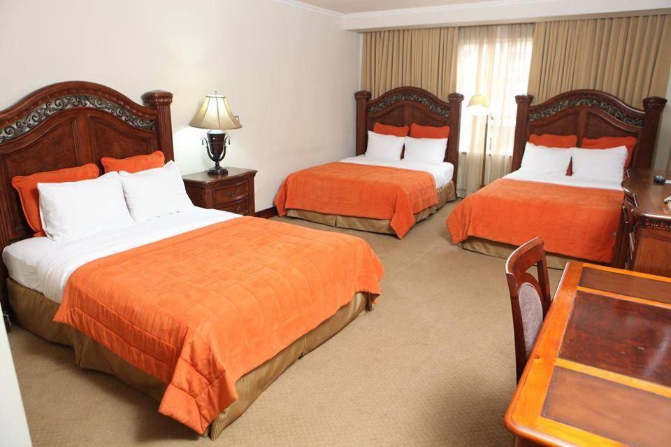 Postel nebo postele na pokoji v ubytování Hotel Gran Mediterraneo