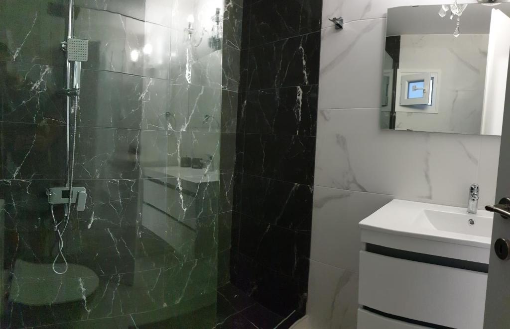 Koupelna v ubytování Diamond Lux Apartment