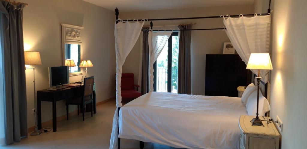 Cama o camas de una habitación en Hotel Villa Marcilla