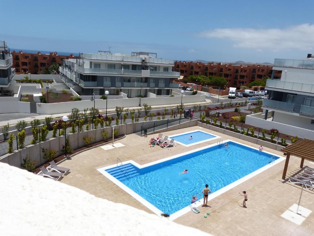 Výhled na bazén z ubytování SUNCANARIAS PENTHOUSE LAS TERRAZAS nebo okolí