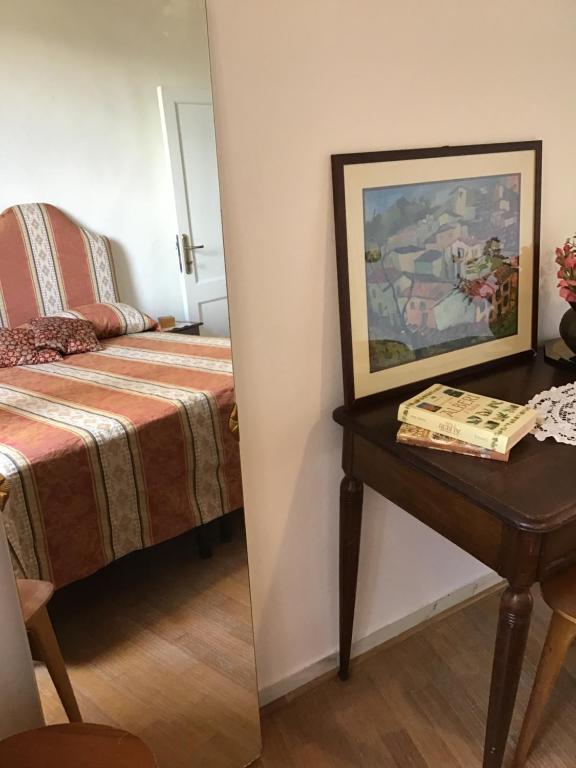 Postel nebo postele na pokoji v ubytování L’Arco
