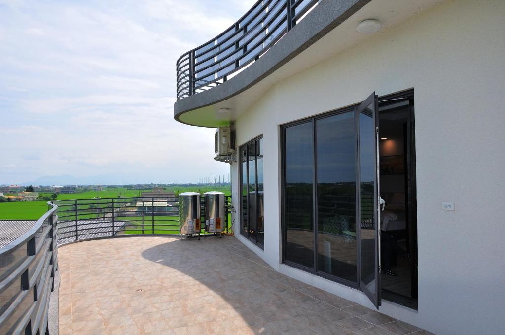 Balkón nebo terasa v ubytování Qian Qian Riverside B&B