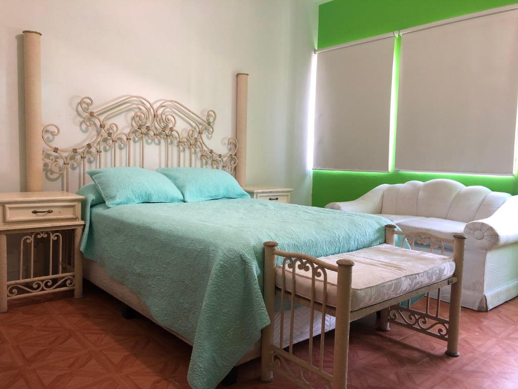 Postel nebo postele na pokoji v ubytování Casa La Minerva