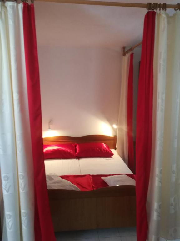 Posteľ alebo postele v izbe v ubytovaní Apartman Aria & Amadea