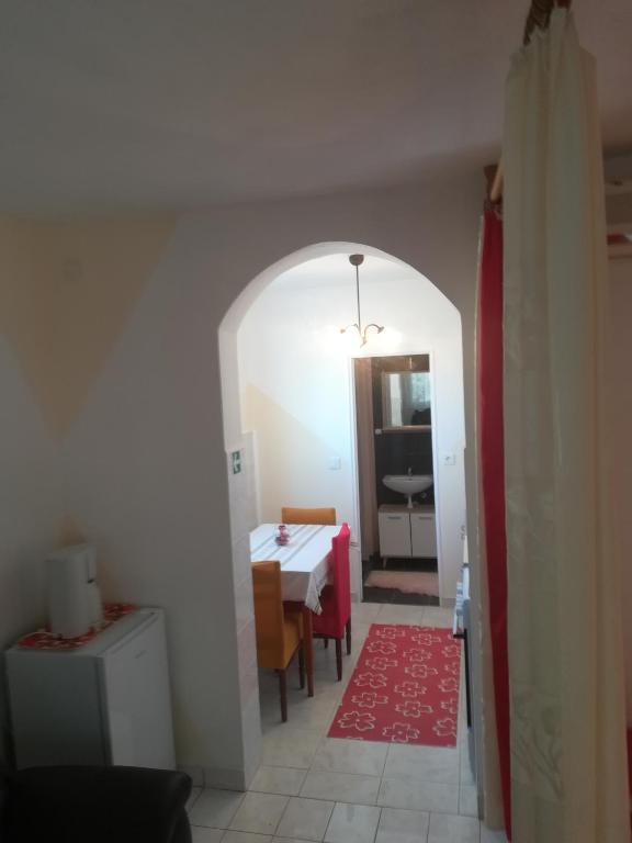 Kuchyňa alebo kuchynka v ubytovaní Apartman Aria & Amadea