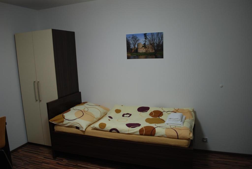 Postel nebo postele na pokoji v ubytování Penzion Na Dědině