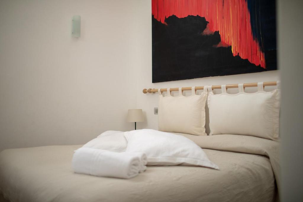 Postel nebo postele na pokoji v ubytování Il Gabbiano Relais in Stromboli