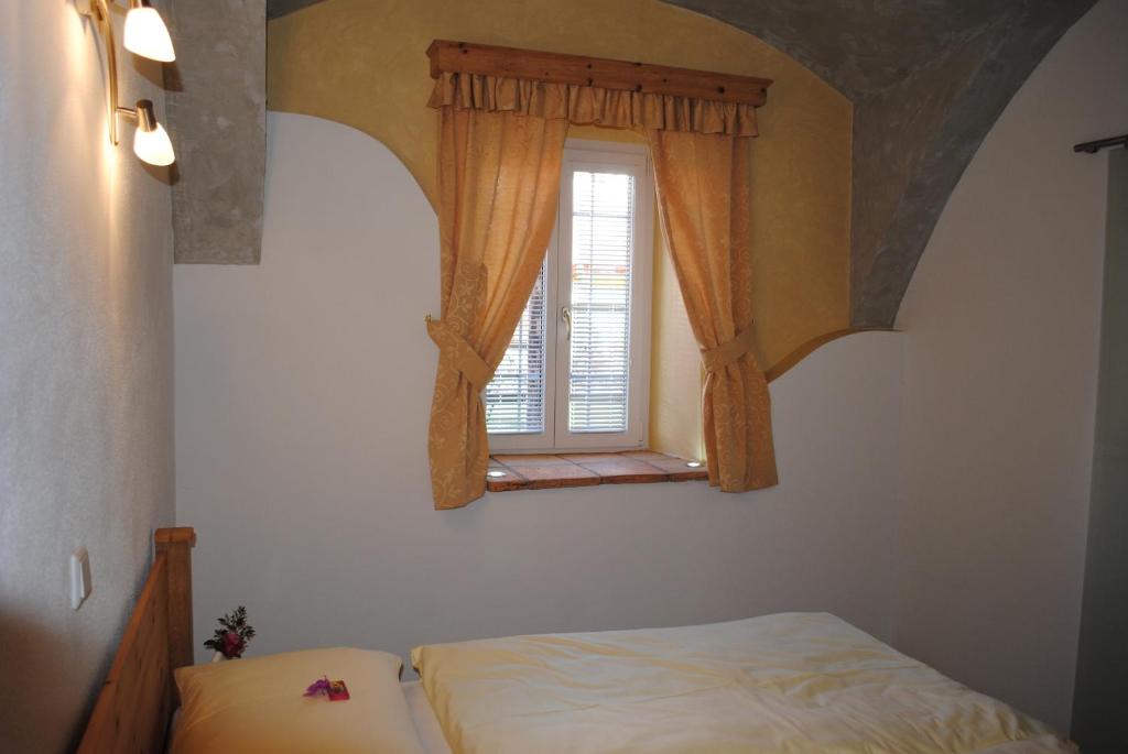 Posteľ alebo postele v izbe v ubytovaní Gartler's Appartements